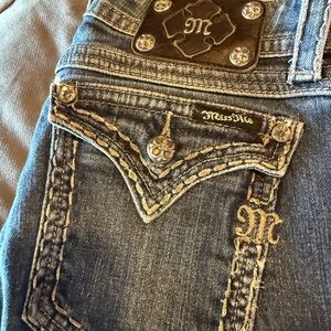 Miss Me Blue Jeans with Ornate Stitching and Rhinestone Embellishments